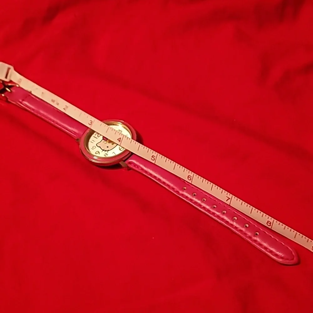 Sanrio Hello Kitty Magenta Gold Watch‎